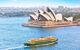 A ferry crossing the harbour in front of the Opera House