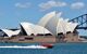 Jet Speed Boat sail under Sydney Opera House and Harbour Bridge in Sydney Harbour, New South Wales, Australia.