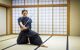 Japanese martial arts athlete training kendo in a dojo - Samaurai practicing in a gym