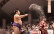 Fighter throwing a handful of salt into the air