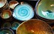 Japanese colorful dishes at shop in Kappabashi, Tokyo, Japan. Shiney blue, green and brown colors are beautiful.
