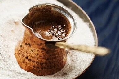 close up of a small jug of Greek coffee