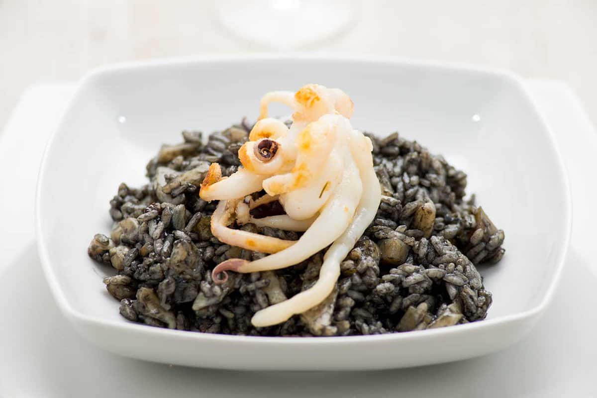 risotto with cuttlefish - traditional foods you must try in Croatia