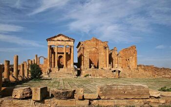 Roman ruins in Sbeitla, Tunisia showing a large ruined temple