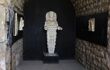 Ancient Greek marble statue of the goddess Artemis with black background