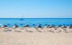 Picturesque view of the sandy beach with the sea in the distance