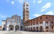 Romanesque Facade and bell tower of St. Martin Cathedral in Lucca,