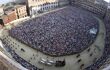Aerial view of Piazza di Campo, full of people awaiting the race