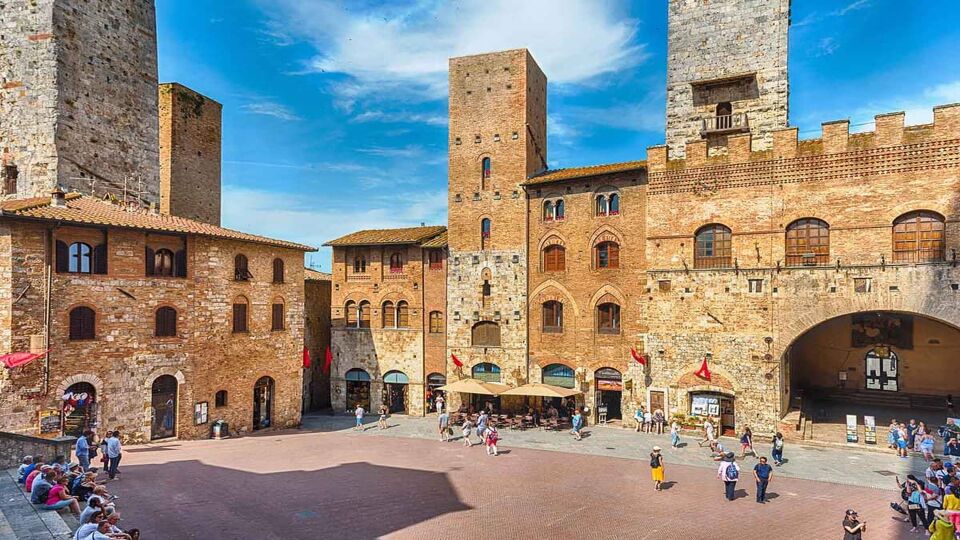 Scenic view of Piazza del Duomo square in the medieval town of San Gimignano