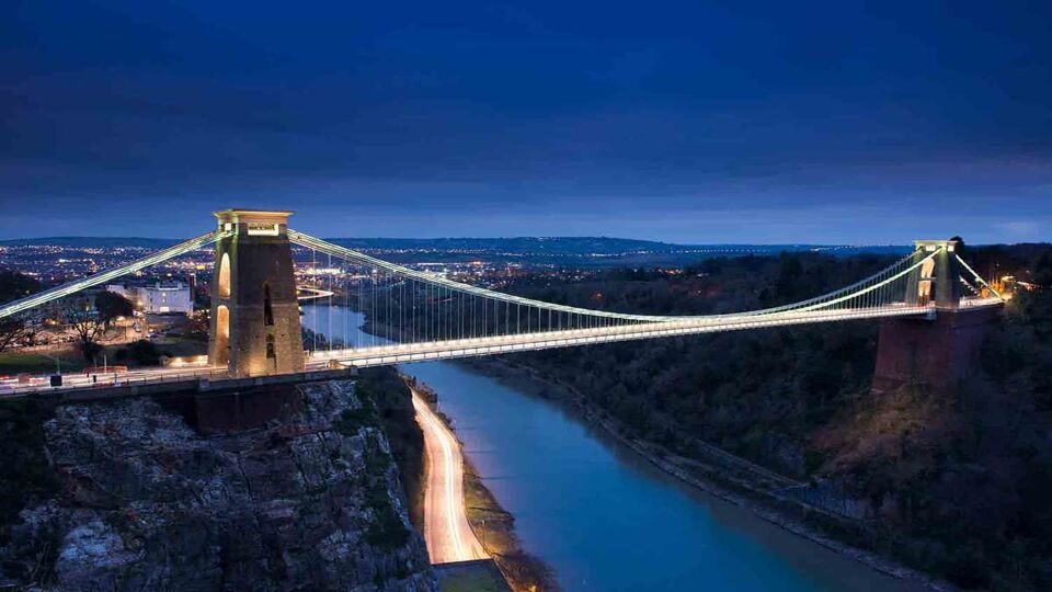 View of the Clifton Suspension Bridge lit up at night