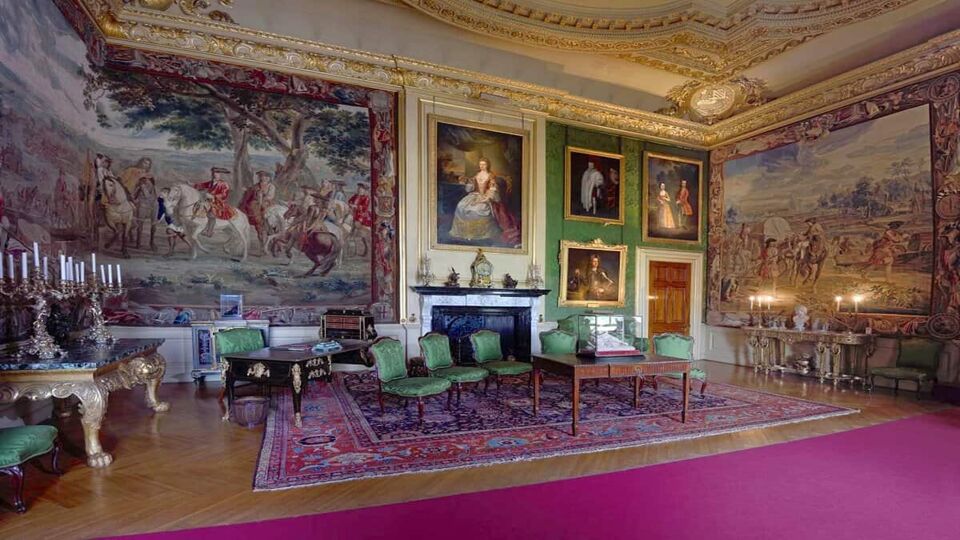 An extravagant room with lots of paintings