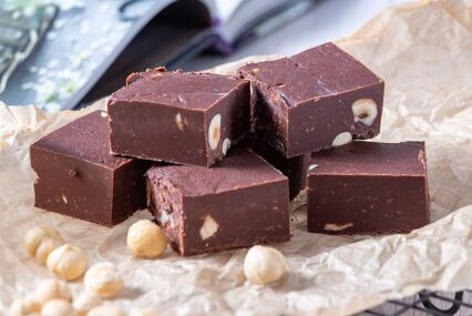 Delicious fudge with homemade chocolate and nuts