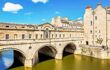 Close up of the golden stone bridge spanning the river Avon