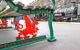 Red dragon metalwork under a bench on the Welsh Highland Railway station in Caernarfon, North Wales