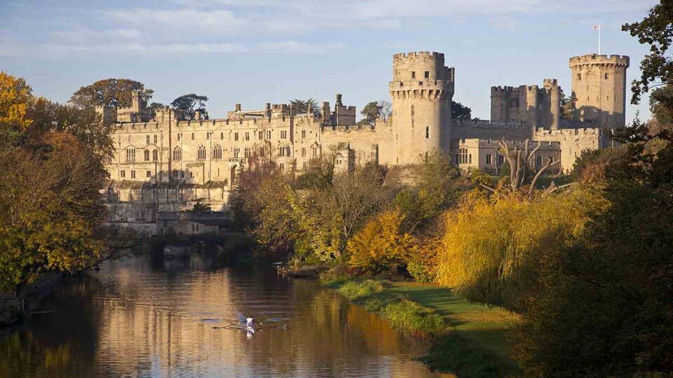 Lovely view of the external castle on the banks of a river