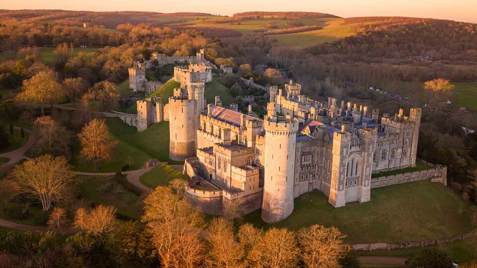 Aerial view of Arundel Castle during a sunset