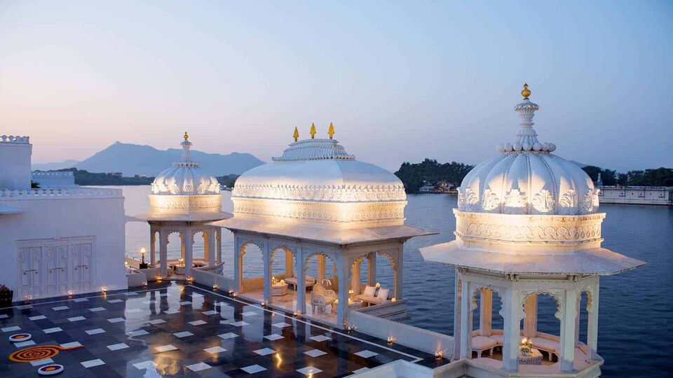 view at night over minarets of Taj Lake Palace Hotel's