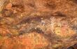Aboriginal rock art in Mutitjulu Cave or Kulpi Mutitjulu, Anangu families caves, along Kuniya walk in Uluru-Kata Tjuta National Park.