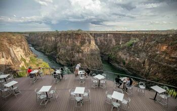 Tables and terrace at the Lookout Cafe in Victoria Falls, overlooking the gorge