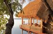 Thatched straw hut over looking the river