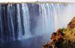 Water tumbling down from the top of the Victoria Falls Waterfall