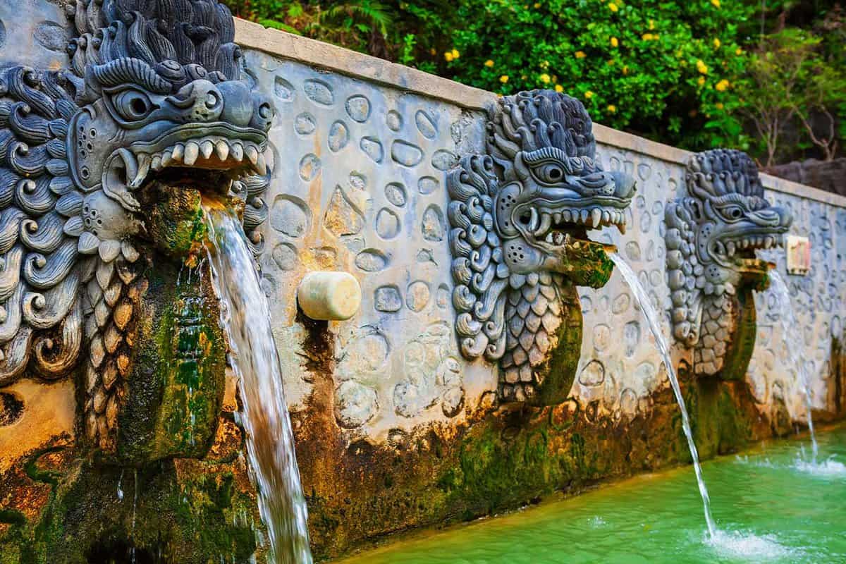 Thermal bath with sulphur mineral water in natural hot spring resort Air Panas Banjar.