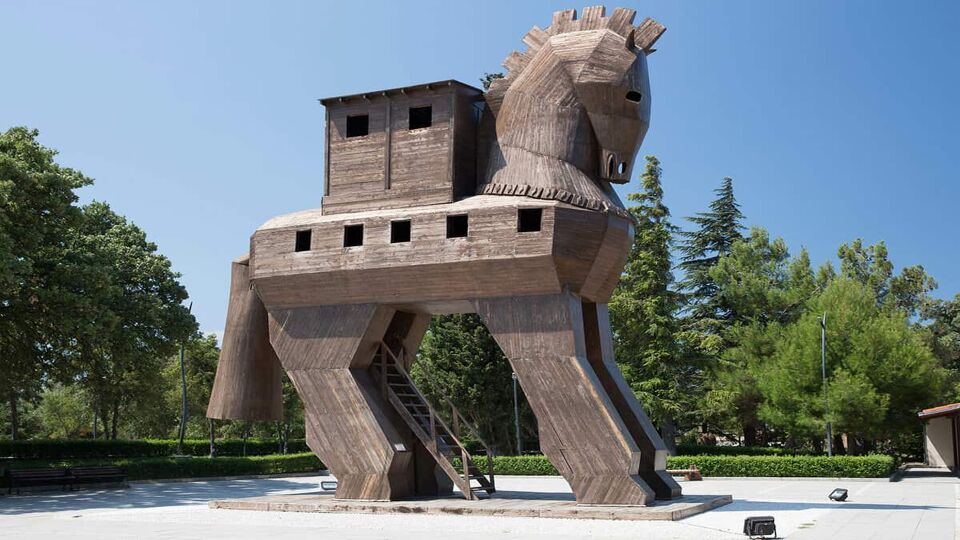big wooden horse with box body and windows