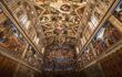 Looking up to the ceiling in the Sistine Chapel