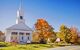 small white church in classic architecture style