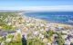 aerial view over town looking out to sea