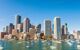 city view taken from the water showing skyscrapers