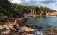 person hiking looking at view of a cove