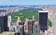 Aerial view of New York's central Park, an oblong of green amidst skyscrapers