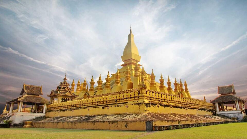 landscape showing a large glowing, golden temple