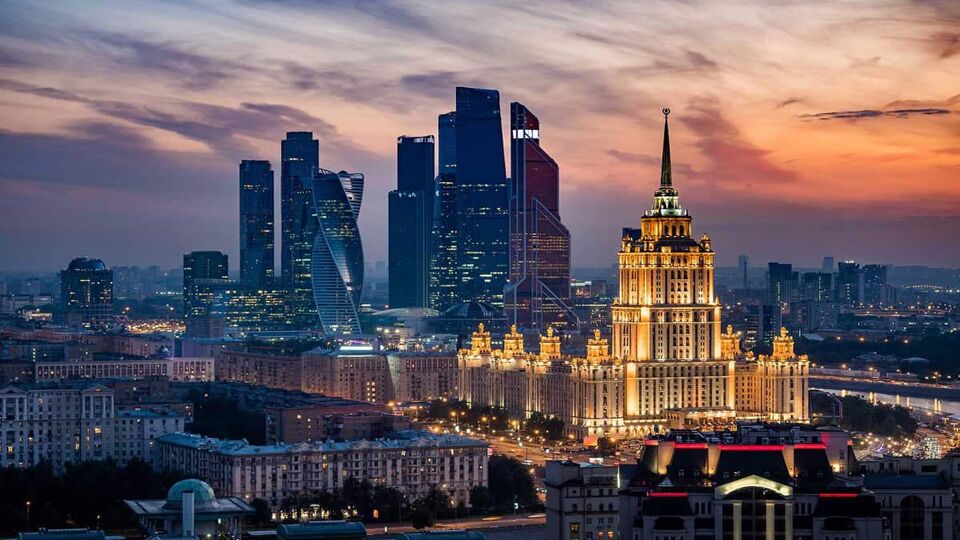 Aerial view of Moscow City skyline at sunset showing architectural landmarks Ukraine Hotel and International Business Center in Moscow, Russia.