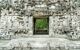 A small doorway set into a temple wall